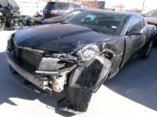 Black Camaro body damage before repair